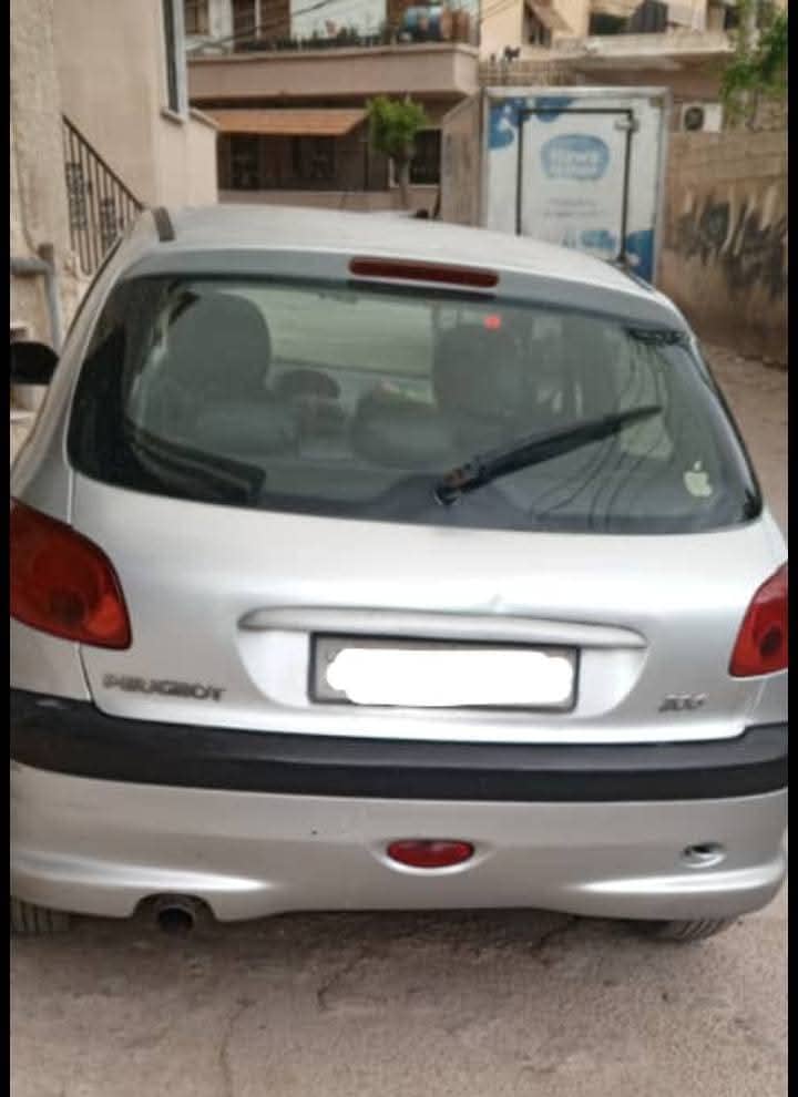 206 بيجو 7/4 خاليه جو وسقف - محافظة دمشق
